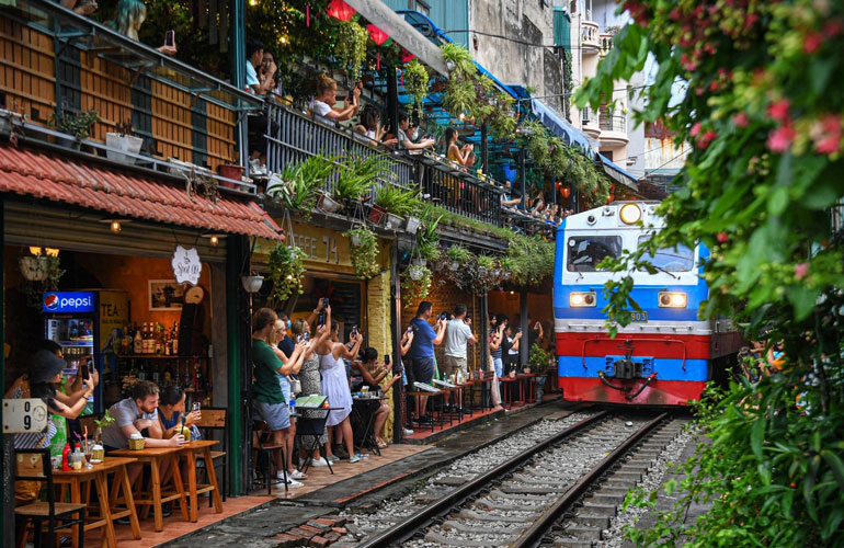 Drinking Coffee in Hanoi Train Street