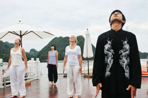 Invigorate your body and mind with a rejuvenating Tai-chi session on the sundeck